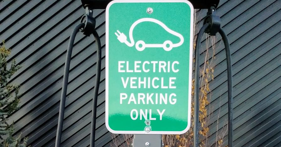 An electric vehicle only parking sign. Look out for these four signs if you think your hybrid car's battery pack is starting to fail.