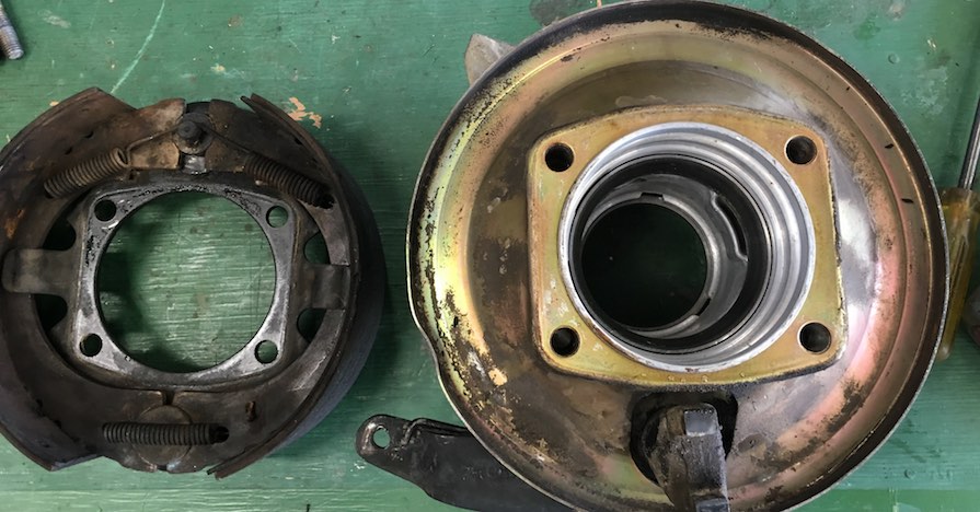 A car's parking brake. Driving with your parking brake on could potentially ruin your car's rear brakes and require you to replace the components. Here's what happens if you forget to disengage your parking brake before going for a drive.