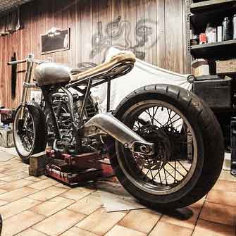 A motorcycle in a garage space